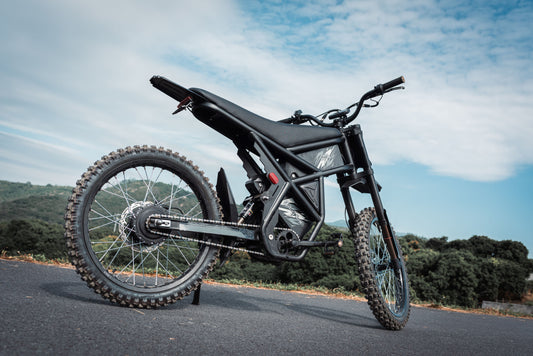 Black electric dirt bike on road