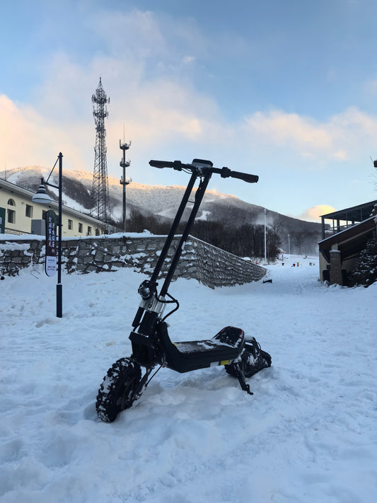 G63 DIY electric scooter in snowy terrain with all-terrain tires and sturdy frame