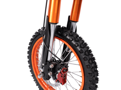 Close-up of GT54 electric mini motorbike front wheel with knobby tire and suspension forks.