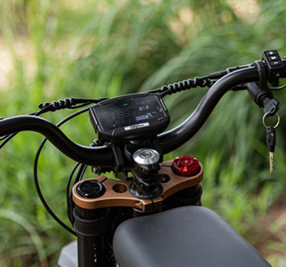 LCD Display Screen mounted on bicycle handlebar showing riding data for speed and distance