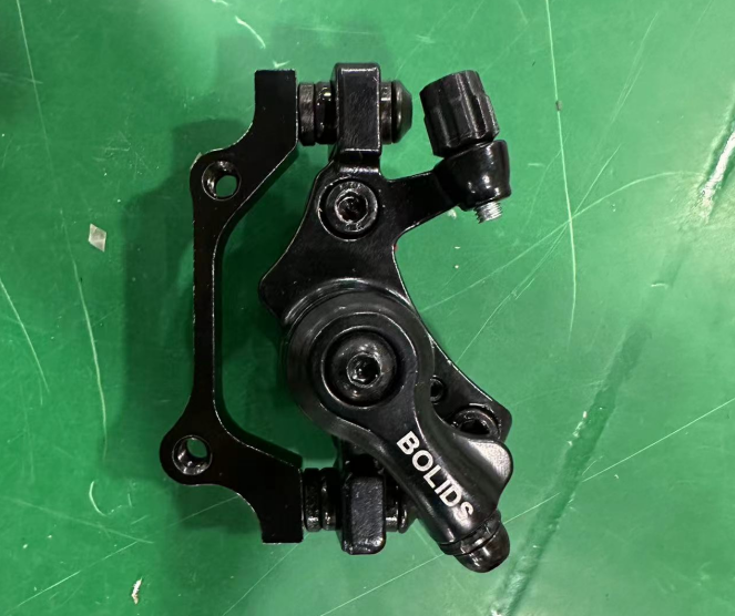High-performance black disc brake caliper for bikes with precise stopping power and durability features