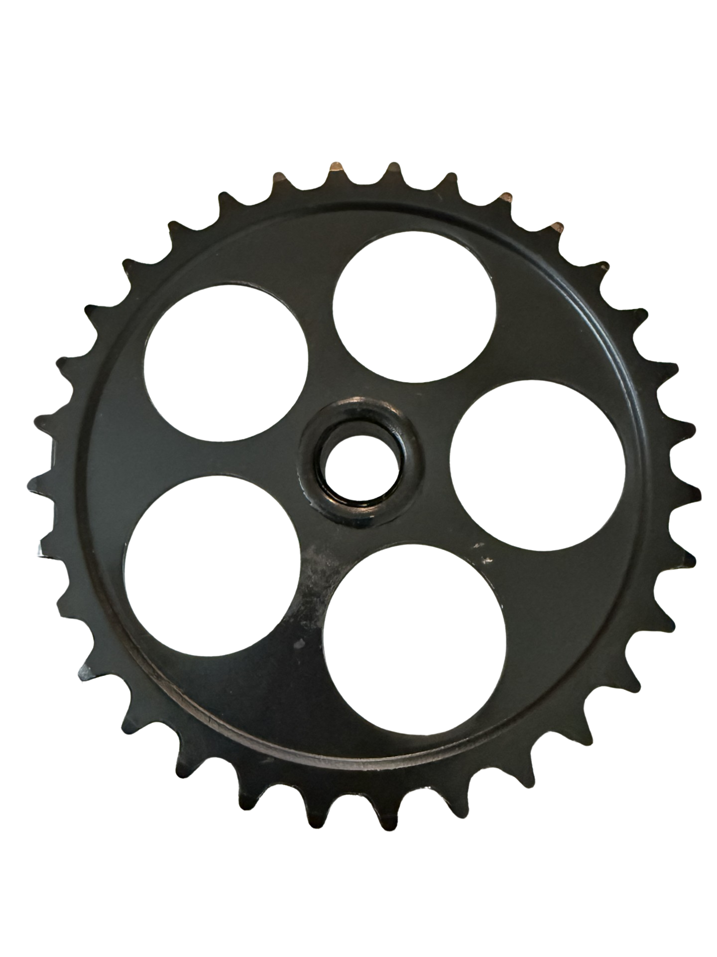 Black metal chainring with circular cutouts and teeth for bike drivetrain power transfer